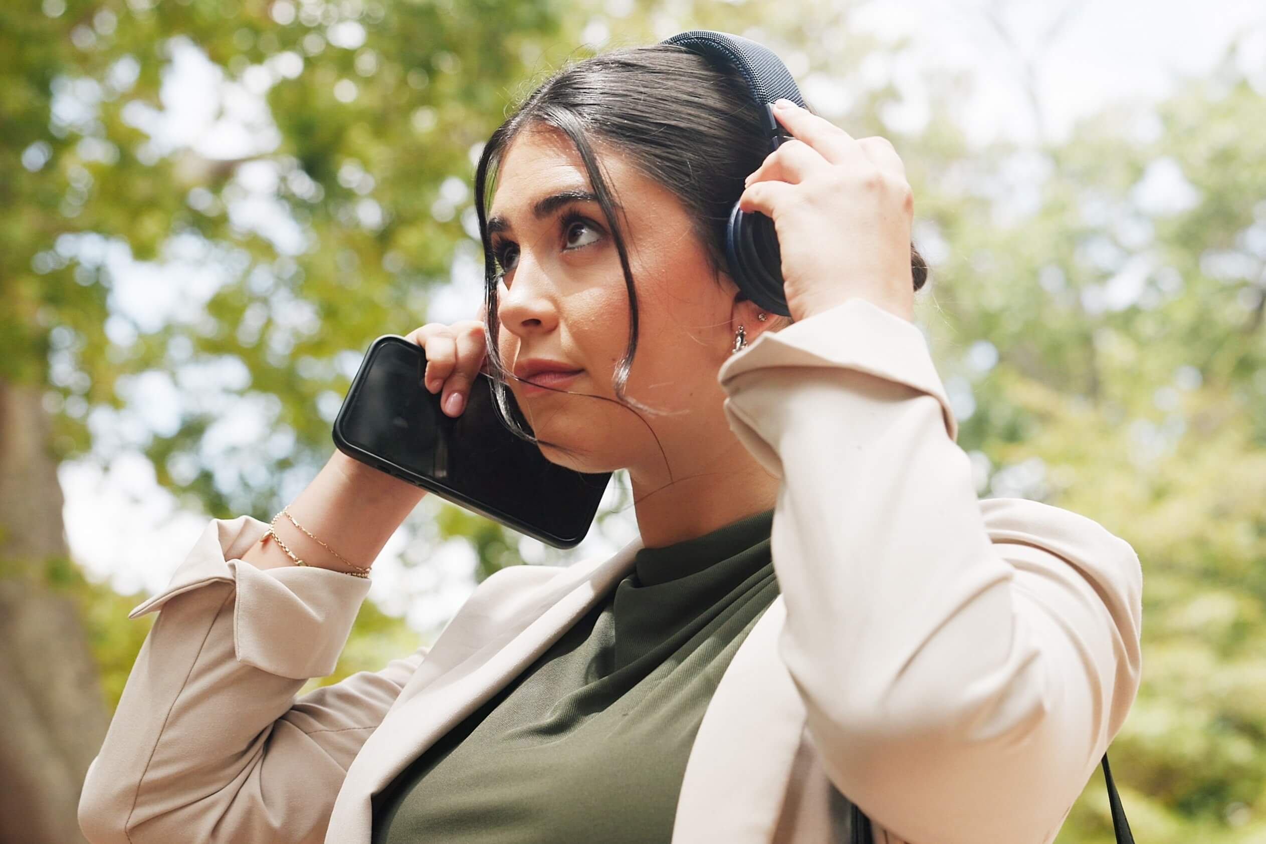 A woman listening to Travel Podcasts.